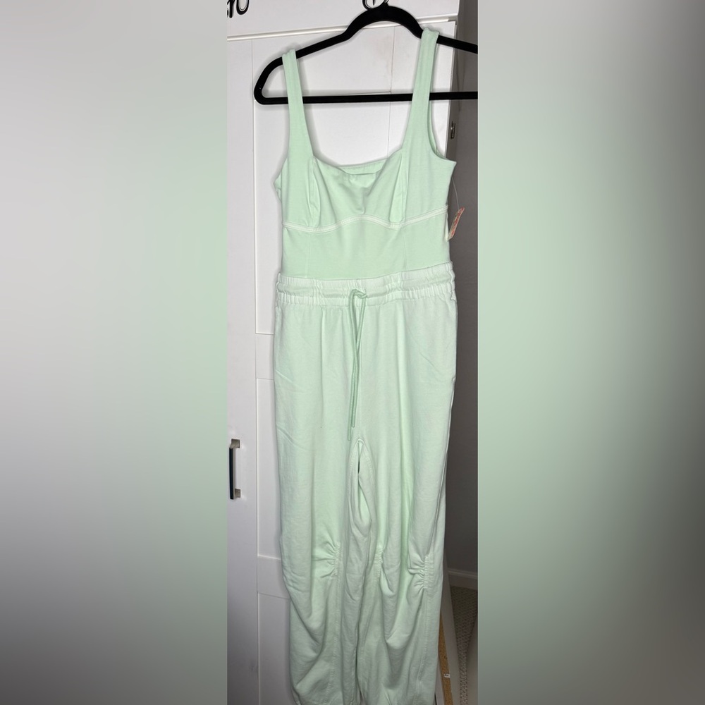 NWT- Free People Movement Inbound Onesie Size S